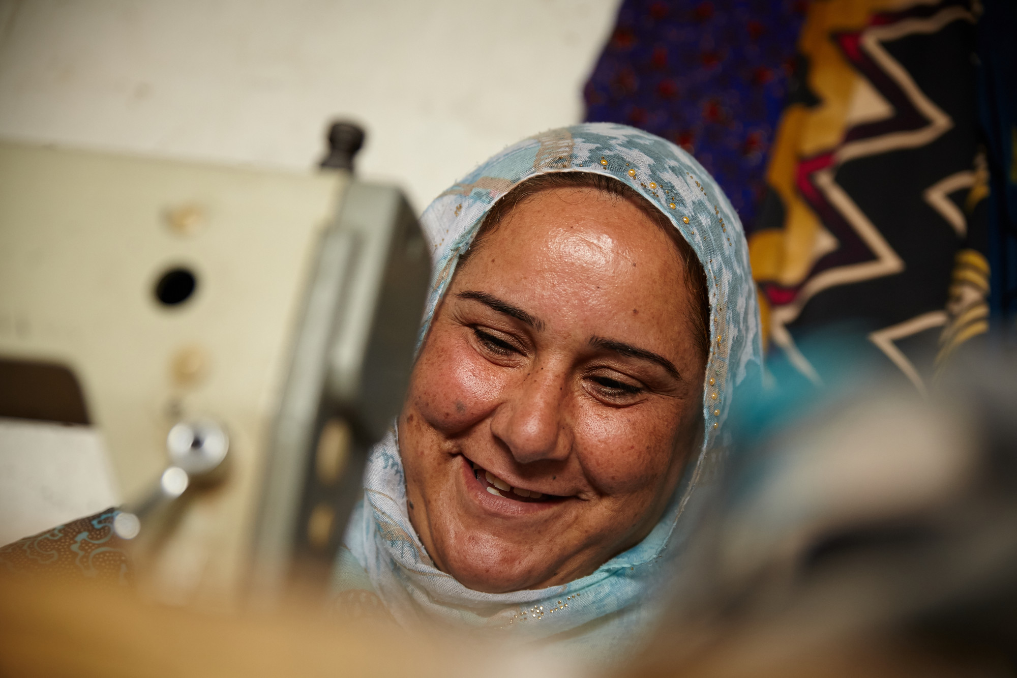 Shireen is a Syrian refugee living in Erbil, Iraq, with her 7 children and her husband. She is a talented tailor and she would like to start a sewing business in her home. Photo: Aidan O'Neill 