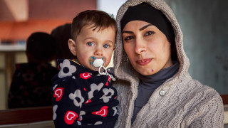 Eman, a Women for Women International programme participant and her son Benjamin. Photo: Emily Kinskey