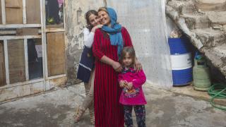 Jihan, a graduate of our Stronger Women, Stronger Nations programme with her daughters.Photo: Alison Baskerville