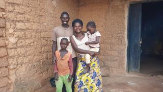 One of our programme participants in Nigeria, Josephine, with her family. Photo credit: Women for Women International. 