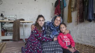 Shireen, graduate of our Stronger Women, Stronger Nations programme in the Kurdistan Region or Iraq, with her daughters. Photo: Alison Baskerville