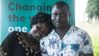 Sarah, participant in our Stronger Women, Stronger Nations programme in South Sudan, with her husband and male representative in our Men’s Engagement Programme, Amule. Thanks to couple’s dialogue sessions, Sarah says she and other women are now able to address issues at home because men are now more willing to listen to them. Photo: Charles Atiki Lomodong