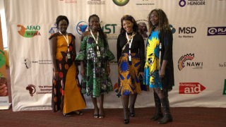 The Women for Women International – South Sudan team and partners at the Gender is My Agenda Campaign annual conference. From left to right: Jenty Sawa (Advocacy Trainer), Poni Abraham (Advocacy Coordinator), one of our NGO partners and Carol Okul (Policy and Advocacy Specialist). Photo: Women for Women International 