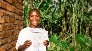 Angelique, a graduate of our Stronger Women, Stronger Nations programme and Change Agent in the Democratic Republic of the Congo. Pictured with her proudly and hard-won certificate of land ownership. She has been campaigning for more women in her community to own land; a right protected by law but too often ignored by male community leaders and family members.