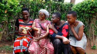 Emerance with her family. Photo: Assoumani Sibomana