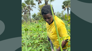 Betty farming her land.