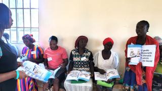 Blessing in a training session with the other 24 women in her group. They are learning about setting SMART goals.