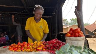 Blessing with produce to sell at the market; turning profit to save. 