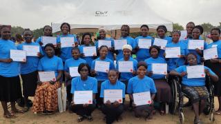 Mary, proudly graduating with her group in April 2024. Photo: Women for Women International