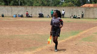 Jozela refereeing a match in South Sudan. 