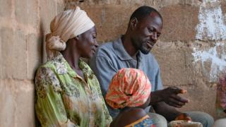 A Men’s Engagement Programme (MEP) graduate at home with his family in Nigeria. Photo: Botul Osman