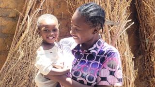 Nerat with her son, Bright. Photo credit: Women for Women International