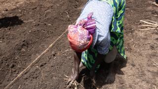 Nsimire was ambushed by uniformed armed men while working on her farm. Photo credit: Women for Women International