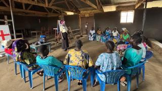 Lilian leads the Change Agents group in her village, helping women address conflicts and build lasting peace in their community. Photo credit: Women for Women International.