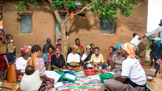 Group of women at a Village Savings and Loan Association meeting
