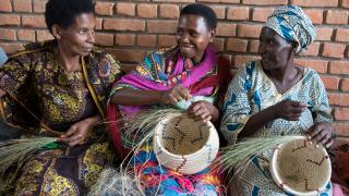 Participants making baskets in Rwanda. 