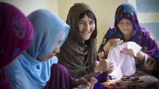 The Friends of Rights Association.Fatima, 60, with hand tumor, knitting_Rada Akba