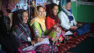 Women for Women International participants in Afghanistan meet in their literacy class. Effective humanitarianism gives those whose voices are silenced the platform to speak for themselves. Photo: Rada Akbar