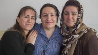 Kabira and Sheiran, two sisters who fled to the Kurdistan Region of Iraq, with Amina a Women for Women International Centre Manager. Without our staff on the ground, our work would not be possible. Photo: Alison Baskerville