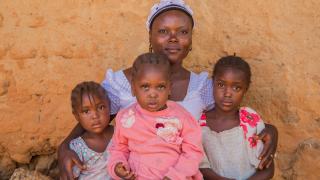 Faith with her three daughters. Photo credit: Monilekan