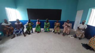 Saratu and her group practice social distancing during a COVID-19 awareness session. Photo: Women for Women International. 