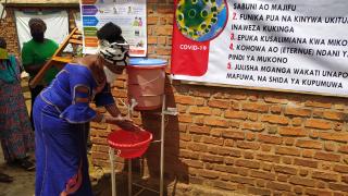 Handwashing station outside a Women for Women International training centre in Kadutu community, Democratic Republic of Congo. Photo: Women for Women International