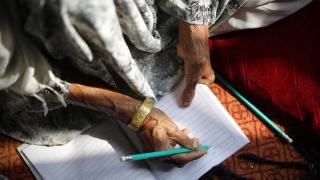 Women for Women International-Afghanistan programme participant writes in her handbook