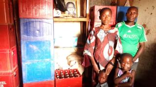 Sukari with her family. Photo: Women for Women International