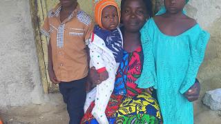 Saratu and her children. Photo: Women for Women International