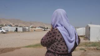 Yazidi women looking out towards the Essyan camp in Iraqi Kurdistan